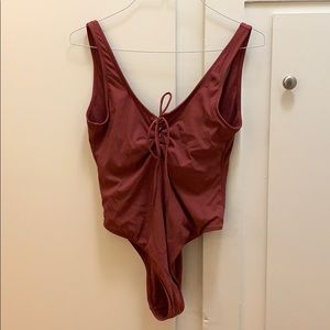 Xhiliration Tie Up Low Back Ribbed One Piece